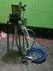 Spray painting machine .